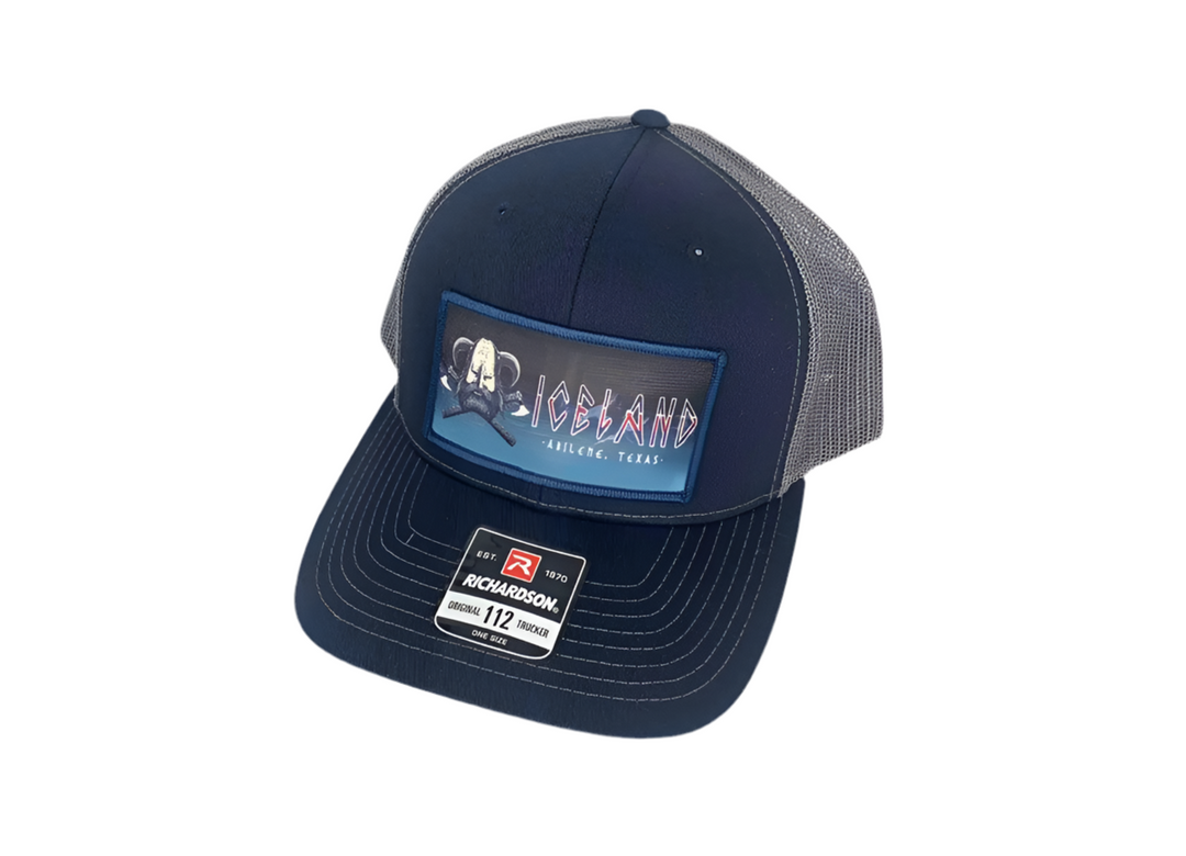 Iceland Coolers navy and gray mesh trucker hat with embroidered Abilene, Texas patch on front panel.