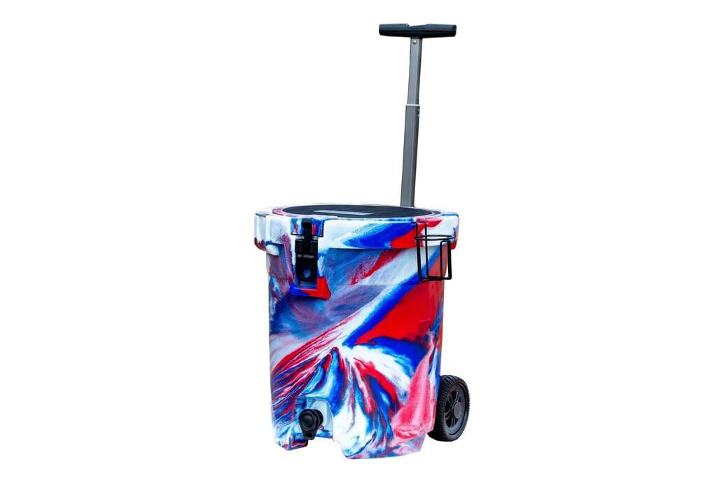 Iceland Coolers 7.5-gal red, white & blue wheeled cooler with spout, cup holder, and tall handle—rugged for tailgates or travel.