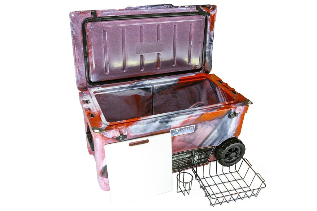 70-quart Iceland Coolers Longship Series wheeled cooler in red swirl with open lid, cutting board, wire basket, and cup holder.