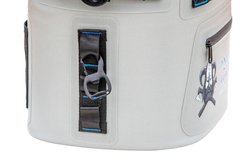 Close-up of Iceland Coolers Saga Series soft cooler showing built-in bottle opener, zipper pocket, and Viking logo detail.