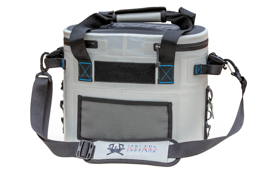 Rear view of gray Iceland Coolers Saga Series 12-can soft cooler with mesh pocket, padded strap, and black-blue stitching.