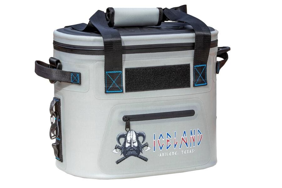 Gray Iceland Coolers Saga Series 12-can soft cooler with shoulder strap, blue stitching, and Viking logo on front pocket.