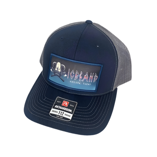 Iceland Coolers navy and gray mesh trucker hat with embroidered Abilene, Texas patch on front panel.
