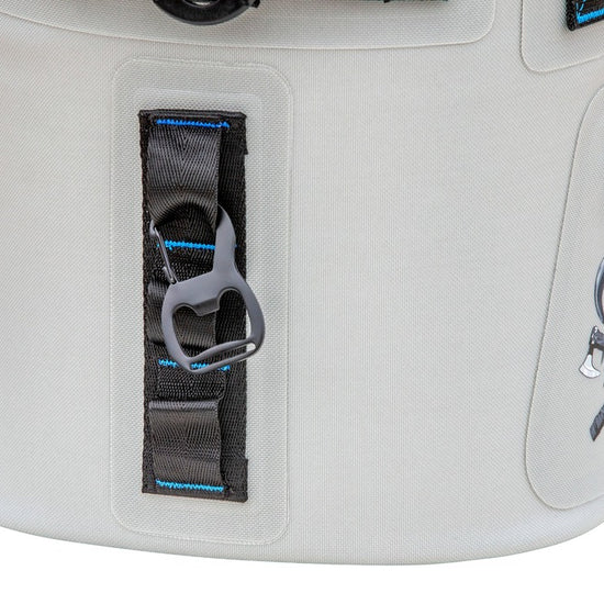 Close-up of Iceland Coolers Saga Series soft cooler showing built-in bottle opener, zipper pocket, and Viking logo detail.