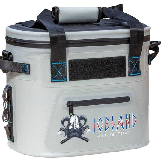 Gray Iceland Coolers Saga Series 12-can soft cooler with shoulder strap, blue stitching, and Viking logo on front pocket.